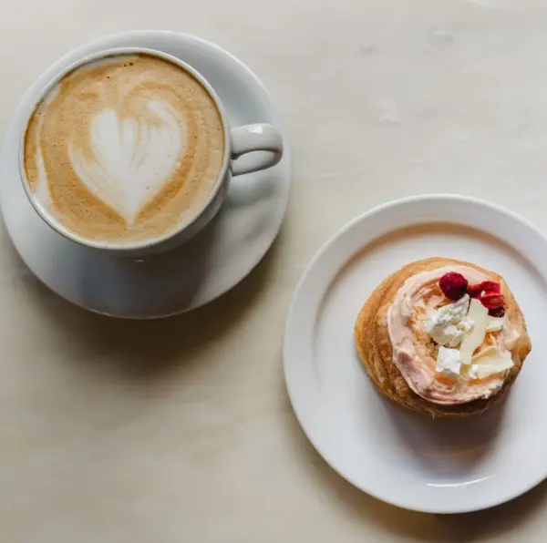 A latte and a pastry at The Batch House
